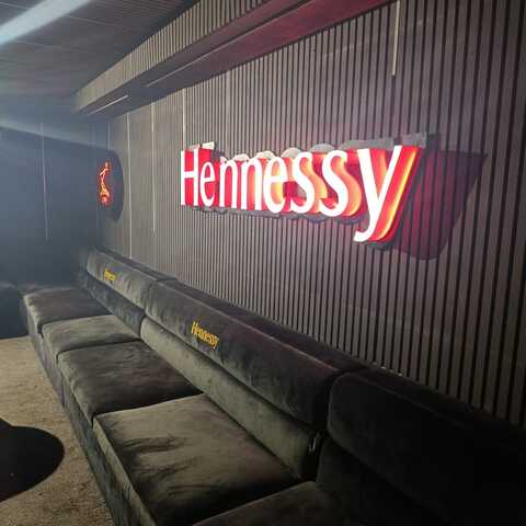 Hennessy LED wall sign in a lounge