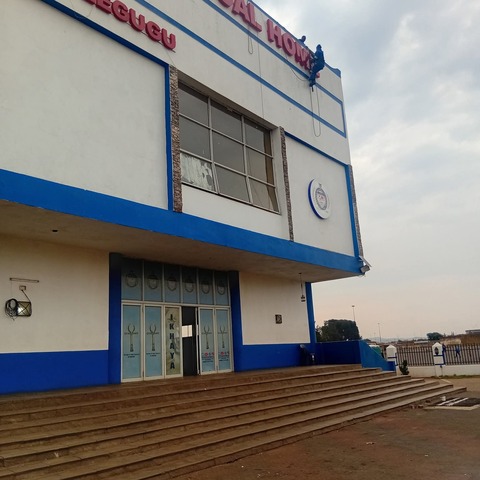 Blue and white commercial building fascia signage